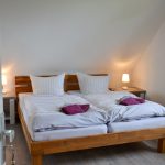 Gemütliches Doppelzimmer mit Sitzgelegenheit in ruhiger Lage der Pension Auetal